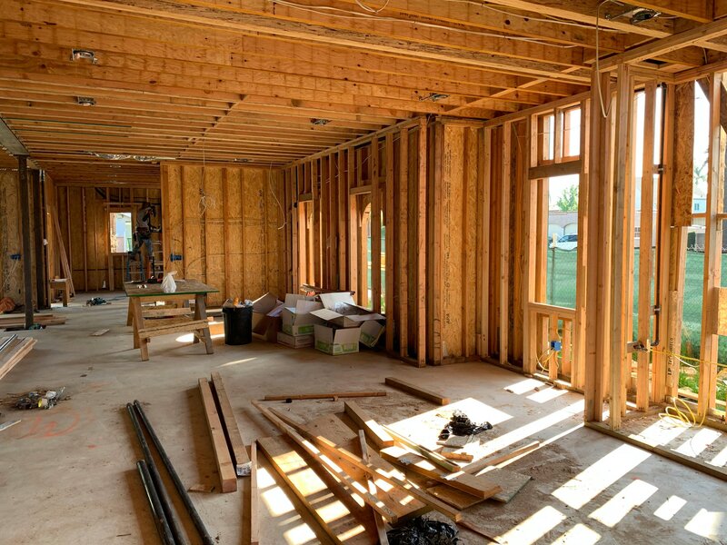 Image of construction site in a home with everything down to the wood panels