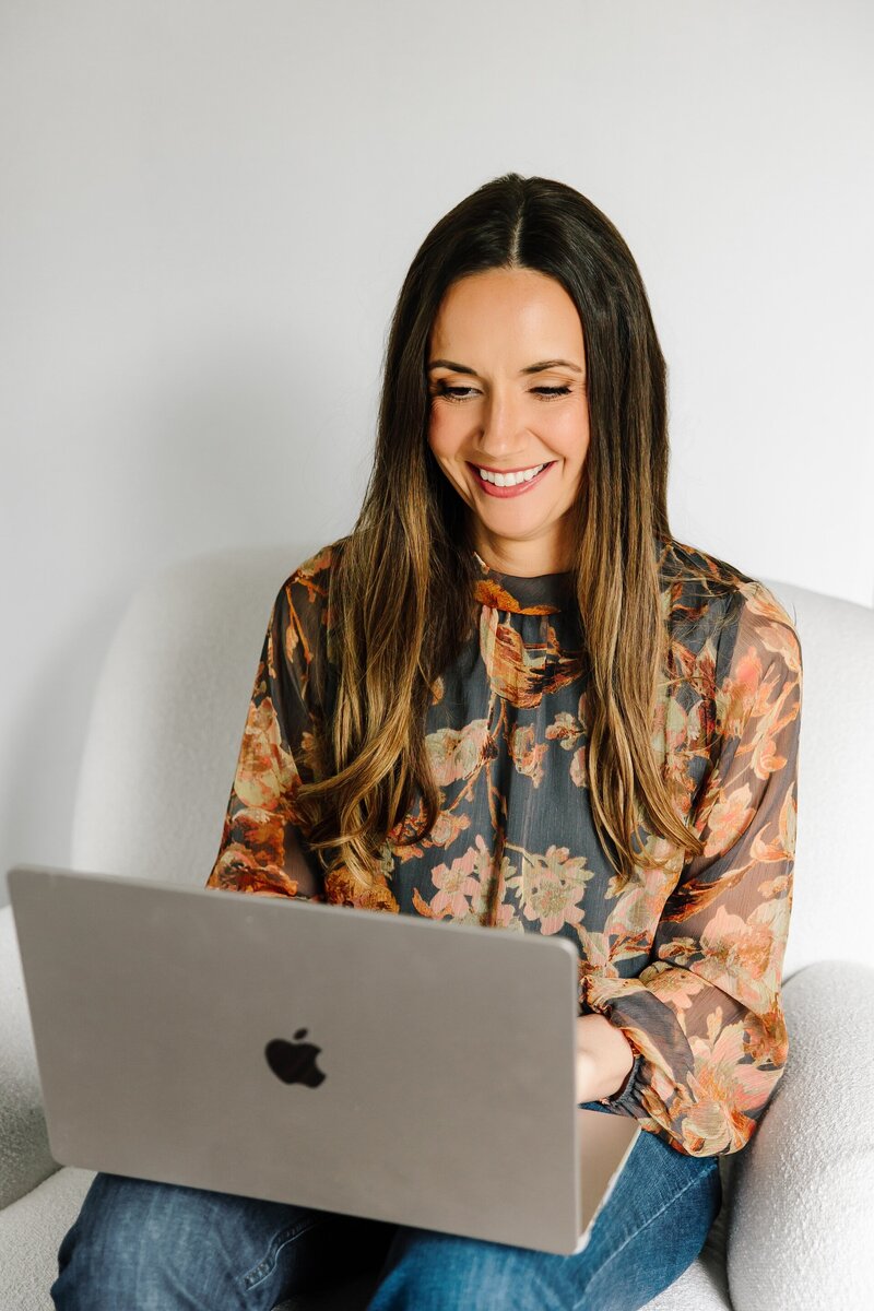 a woman working on a laptop