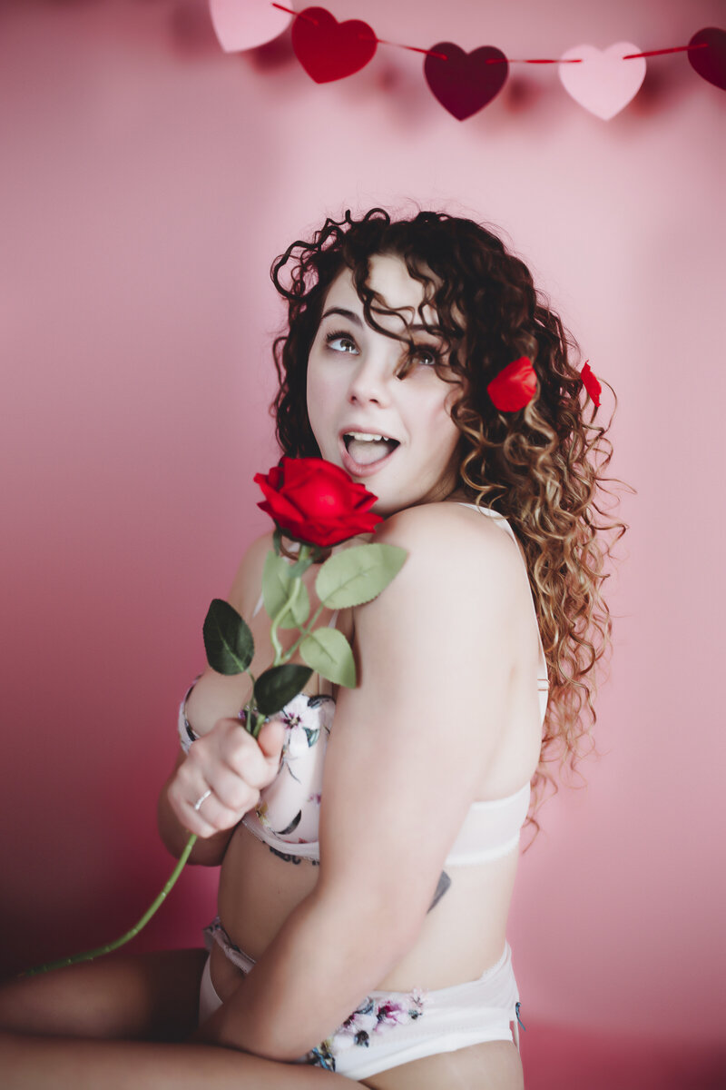 Valentine's Day boudoir session in Indianapolis with a red rose
