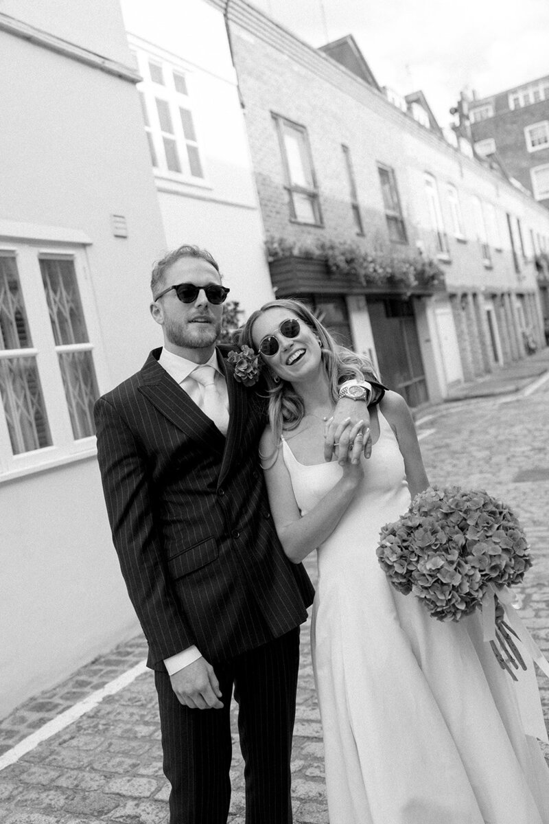 Fashion forward wedding photographer London with a bride in a vintage dress