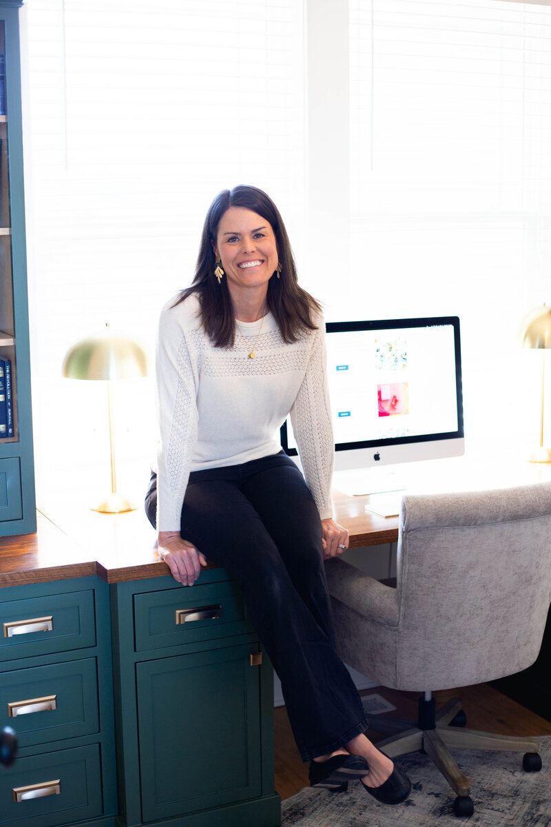 Jess in her office where she prepares for and conducts hormone coaching