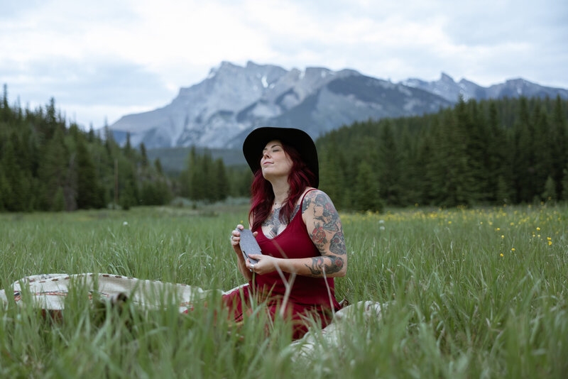 Ellen, intuitive guide and coach at the Guiding Raven Wellness, holding space for grounded transformation, emotional release, and soulful support in Banff, Alberta