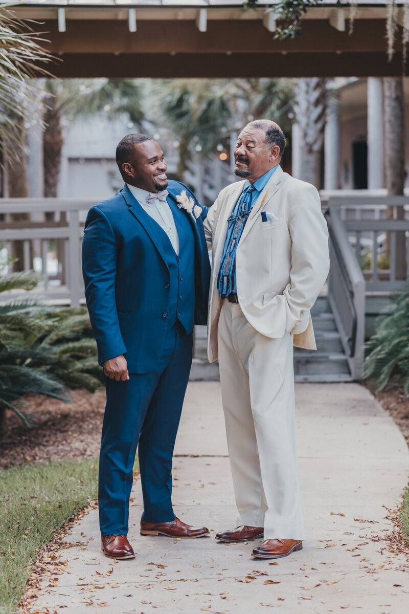 groom with father before hilton head wedding ceremony