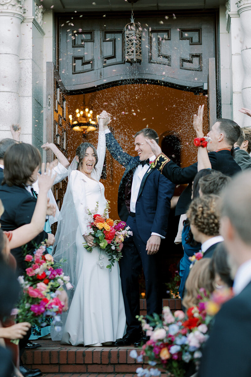 Wedding attendees celebrate a newly wed couple in Northern California.