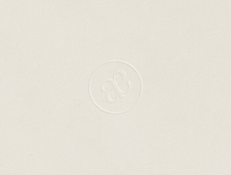 Embossed photographer branding mark