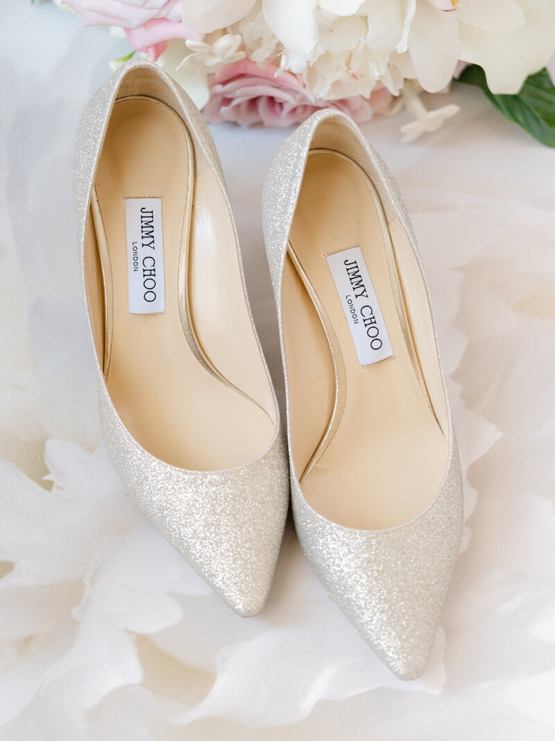 Designer bridal shoes with elegant floral details captured by Spokane fine art wedding photographer