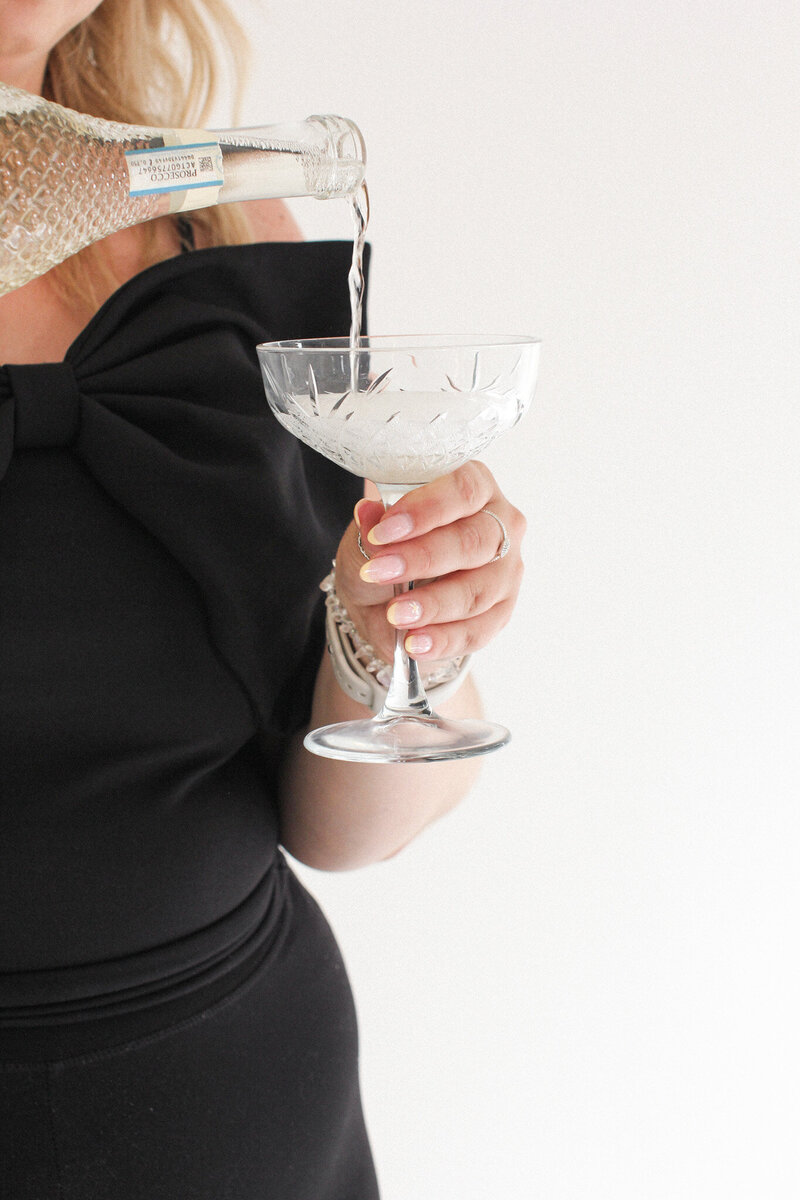 pouring the champagne