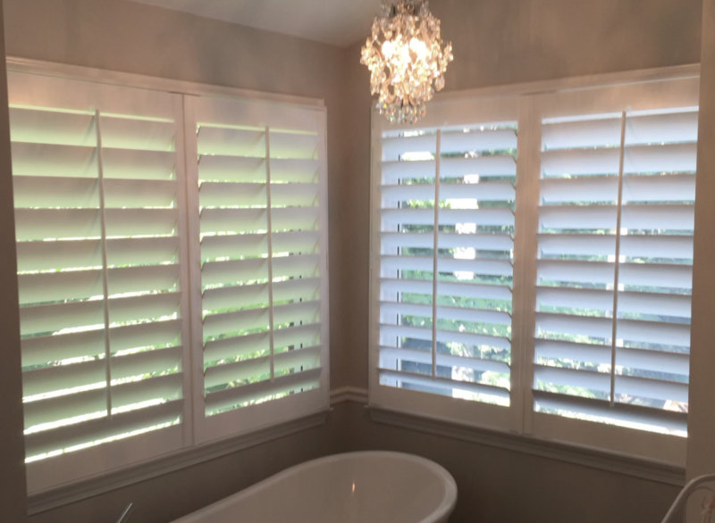 Custom shutters in a bathroom with natural light
