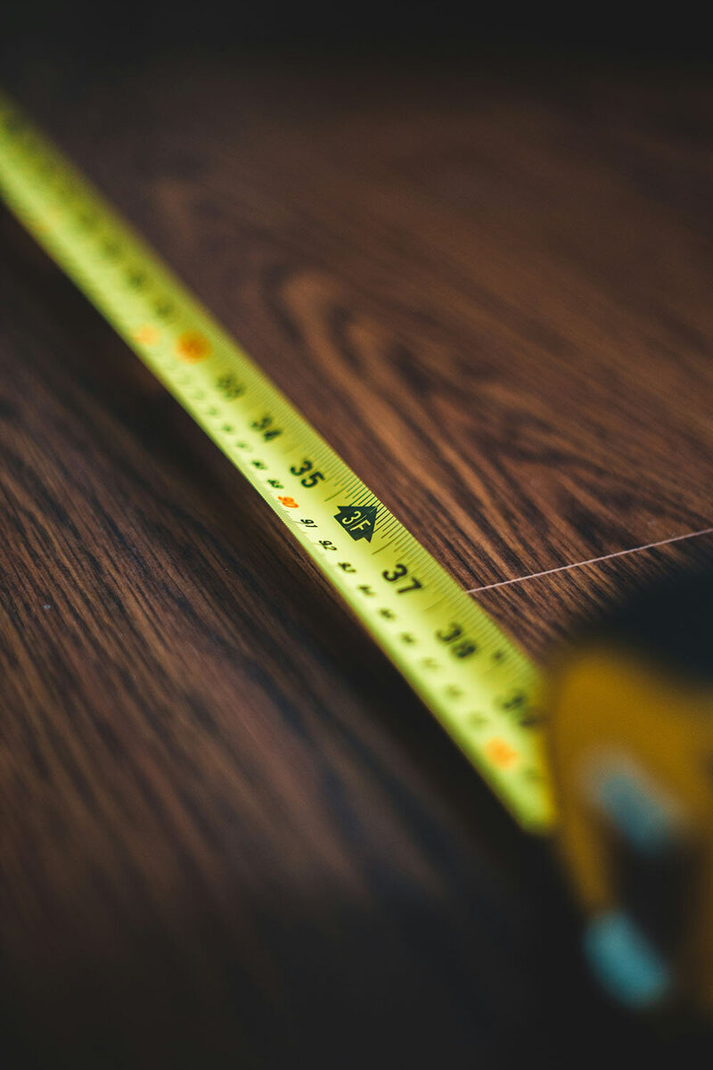 Stock photo of a close-up of a measuring tape. 