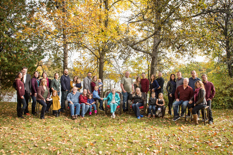 multi-generation large family photo at the cottage in the fall taken by Ottawa Family Photographer JEMMAN Photography