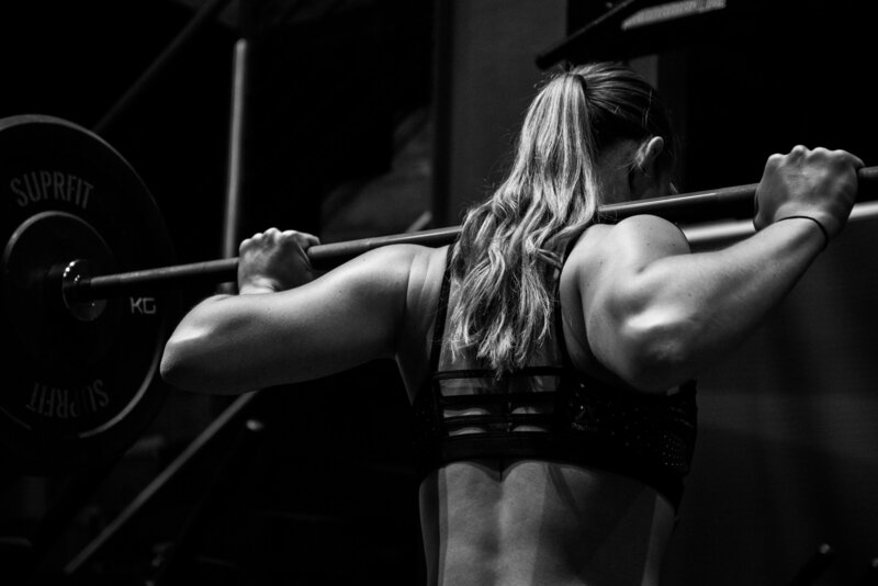 Woman performing a strength training program