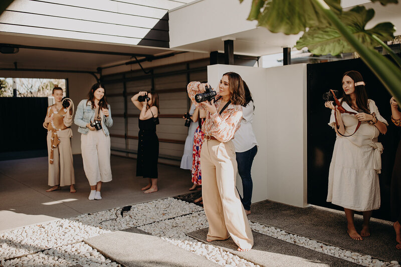 Group of women photographers at Sophie Lea Academy workshop in Sydney.