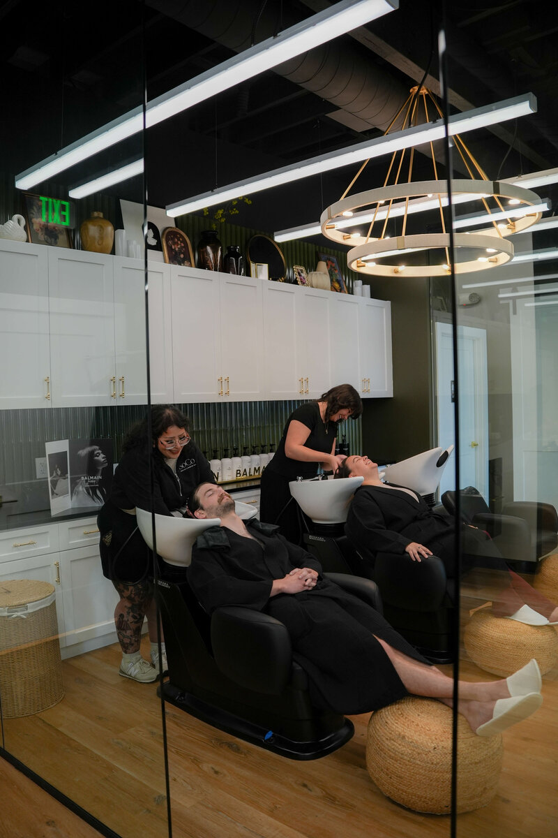 Application of a hair growth scalp serum at SoCo Head Spa.
