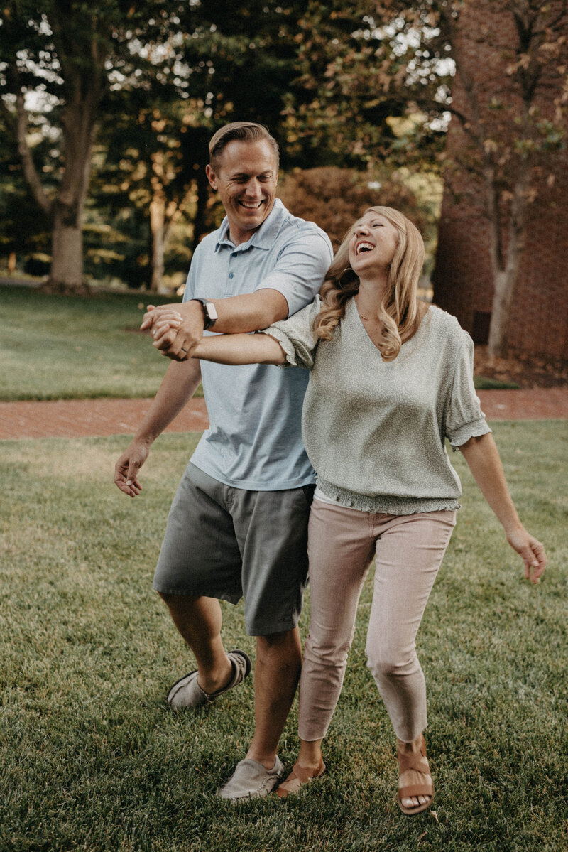 mom and dad laughing