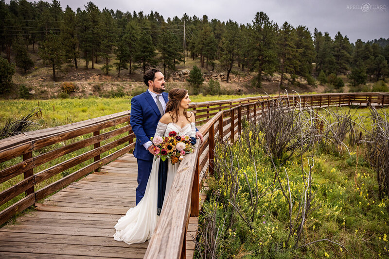 Wedding Photo on the Wooden Boardwalk at Evergreen Lake House