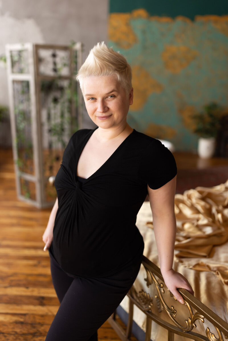 Photo of Jessie, owner of Stories Untold Studios, a boudoir photographer