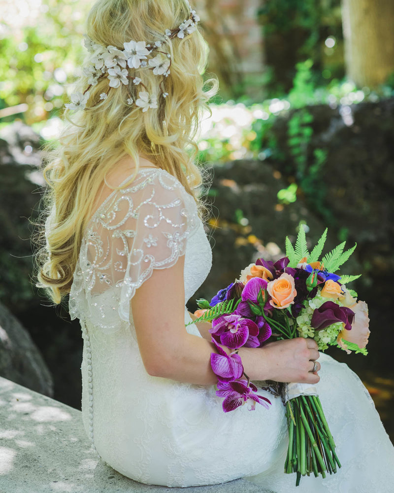 Bridal Portrait from behind of Bride holding her bouquet