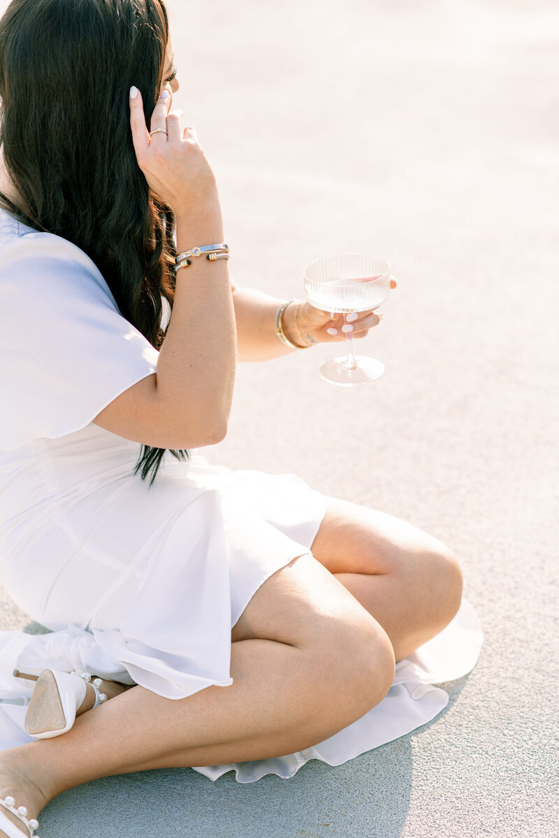 bride holding champagne coupe