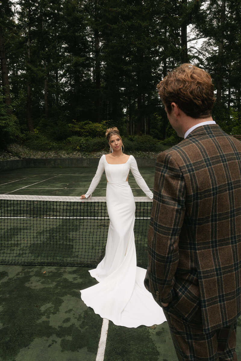 "Intimate portrait of a couple sharing a quiet moment during their Quadra Island wedding, photographed by Rae Terrillon.