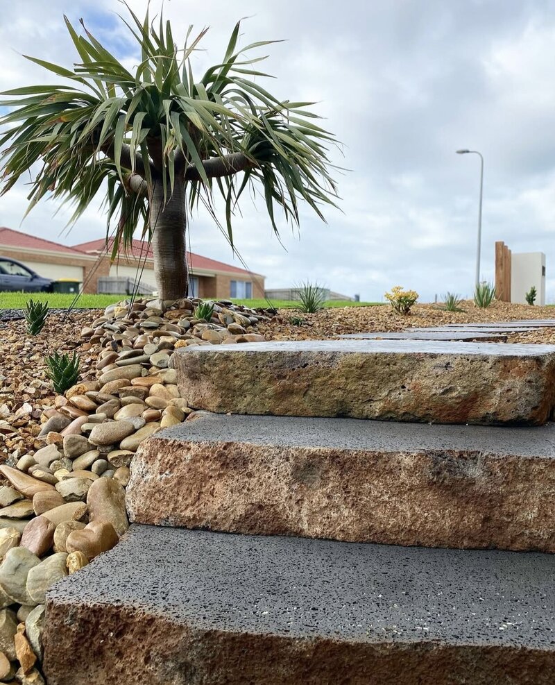 Natural rock steps in an elegant landscape design in warrnambool. 