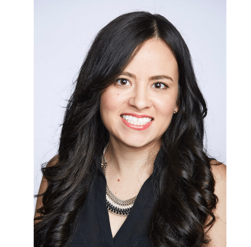 Latina Hispanic woman smiling in her professional headshot