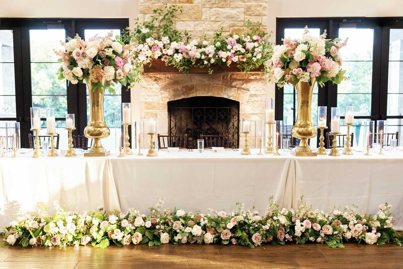 indoor head table in front of fireplace