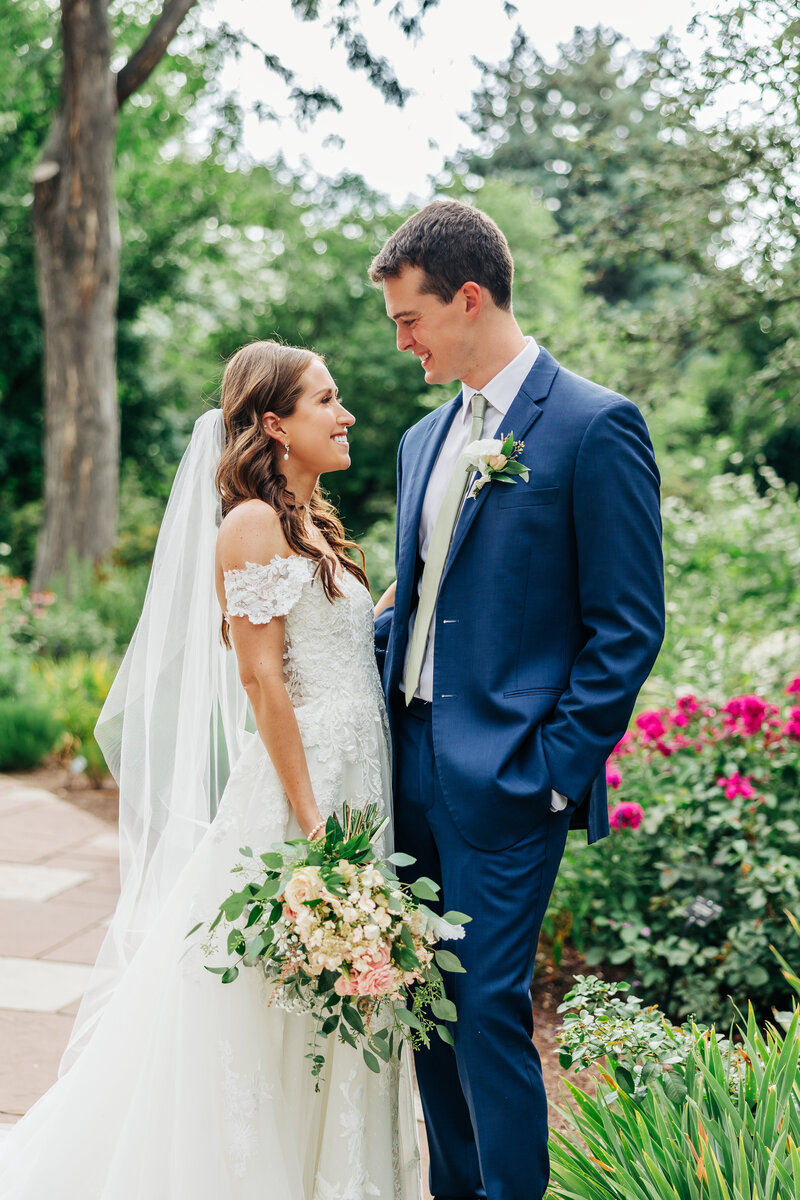 Denver Wedding Photographer captures bride and groom laughing together after intimate wedding