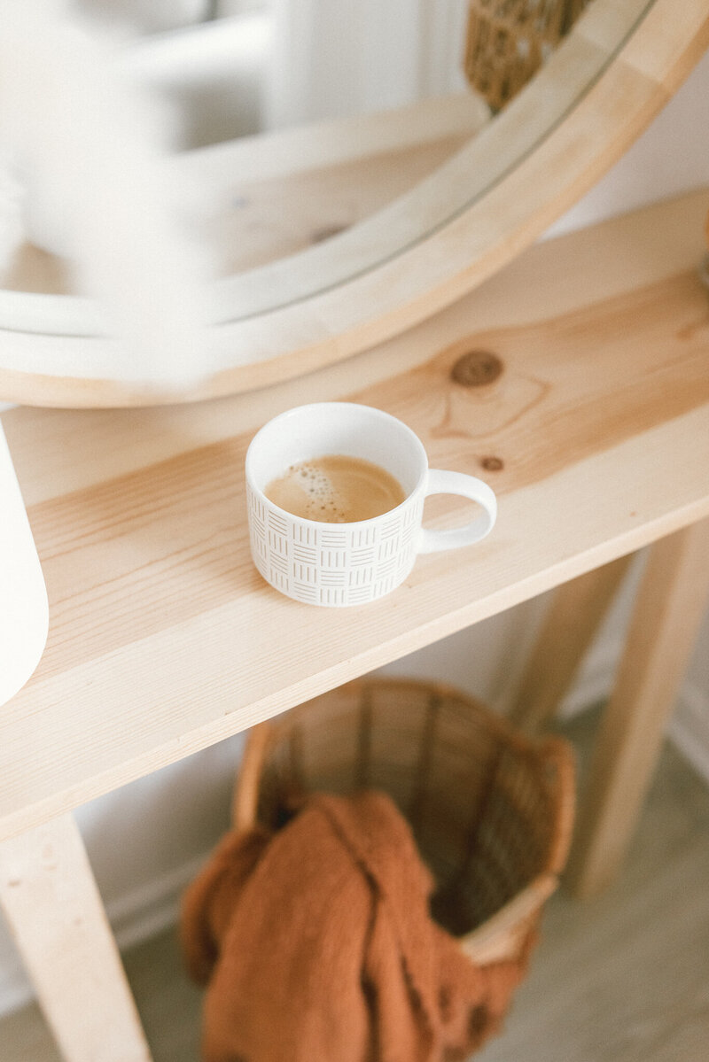 Coffee cup on living room table in real estate home