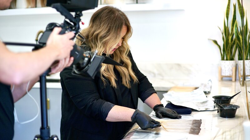 Filming education within a salon space
