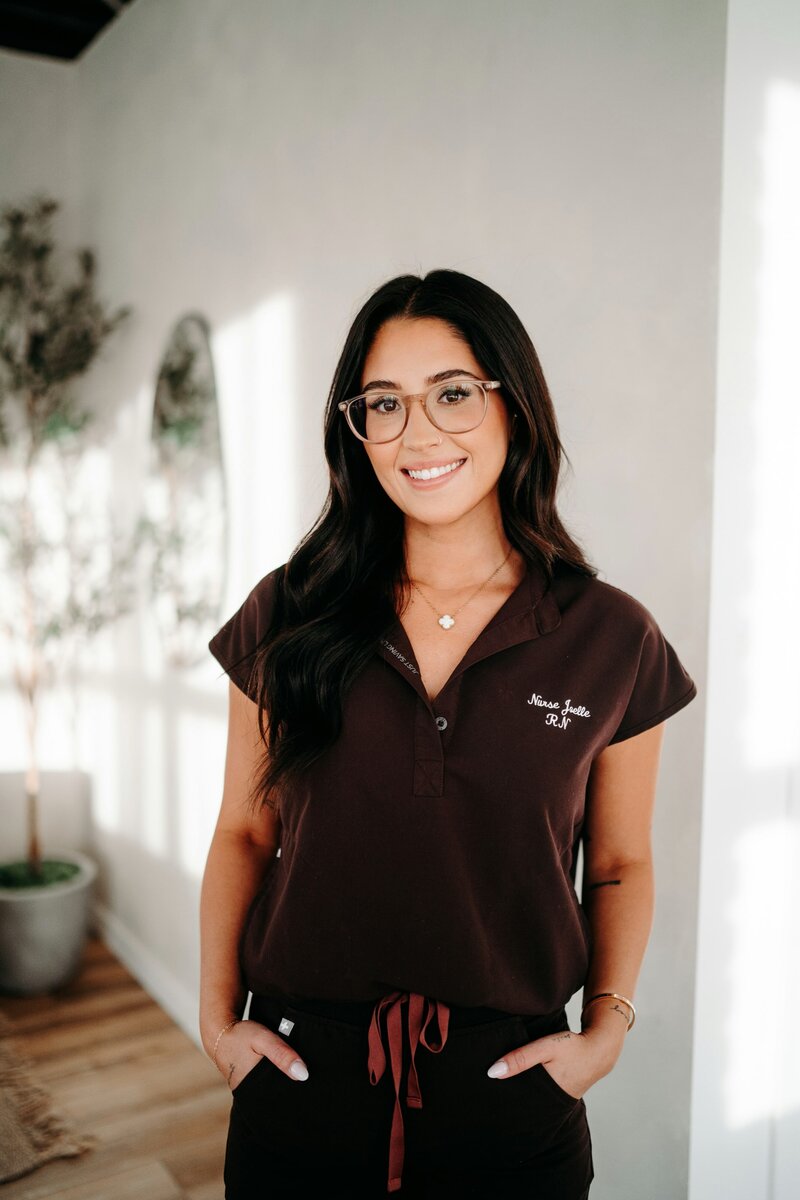 Nurse Injector in Brown Scrubs