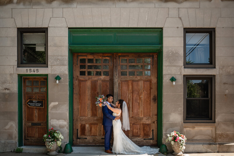 Bride and groom outside the firehouse Chicago wedding venue.