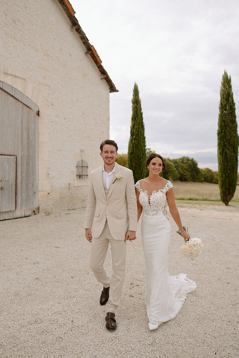 bride and groom laughing
