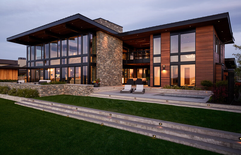 modern-mountain-house-exterior-stone-wood-steel