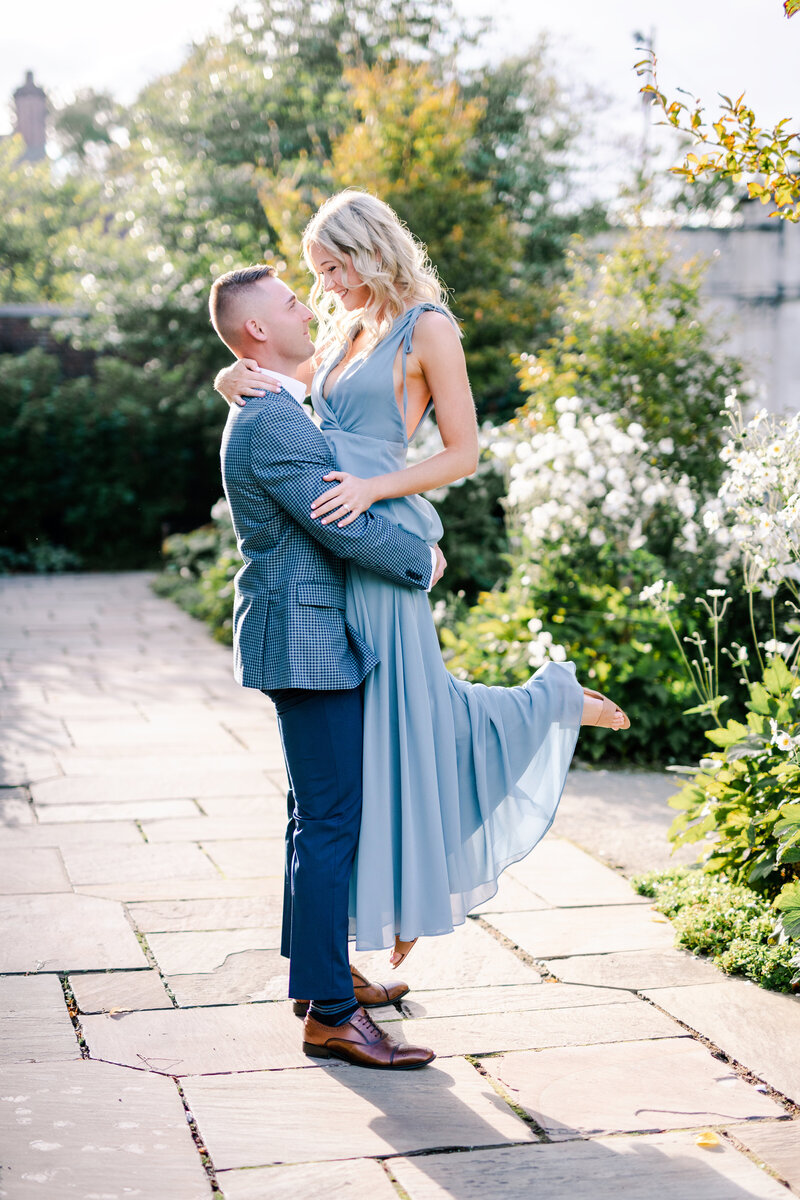 Pittsburgh wedding photographer Amber Marie captures a romantic wedding couple in a natural garden setting.