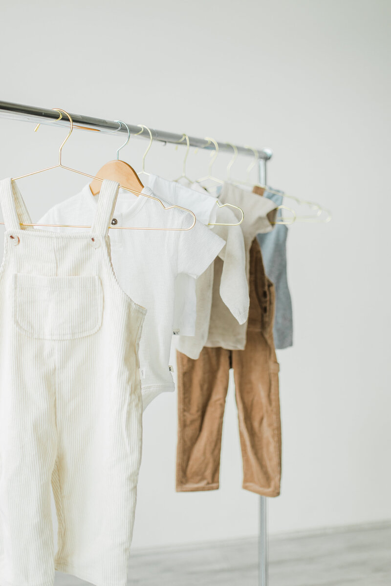 Children's clothes hanging on a rack