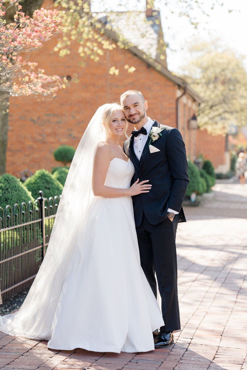 bride and groom portraits after ceremony photographed by cincinnati wedding photographer ashleigh grzybowski