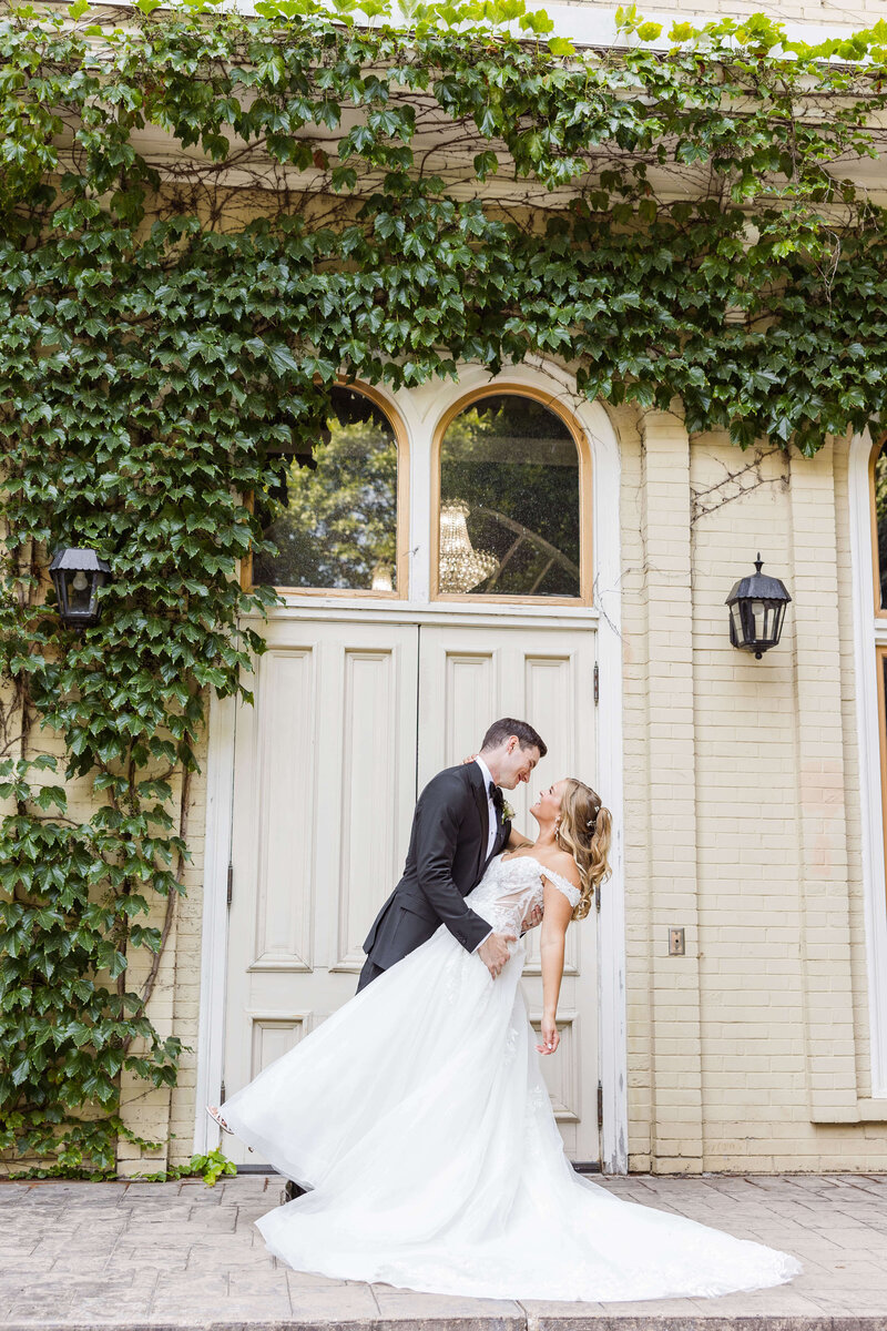 Bride and Groom Dip in front of the Fitzgerald in Milwaukee, Wisconsin