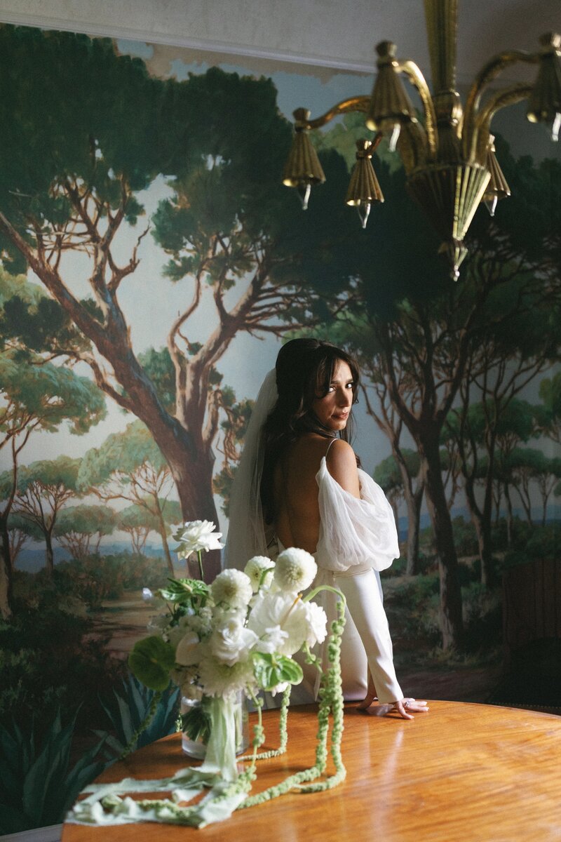 Romantic bridal portrait among lush greenery at Commodore Perry Estate in Austin. A dreamy and ethereal wedding moment.