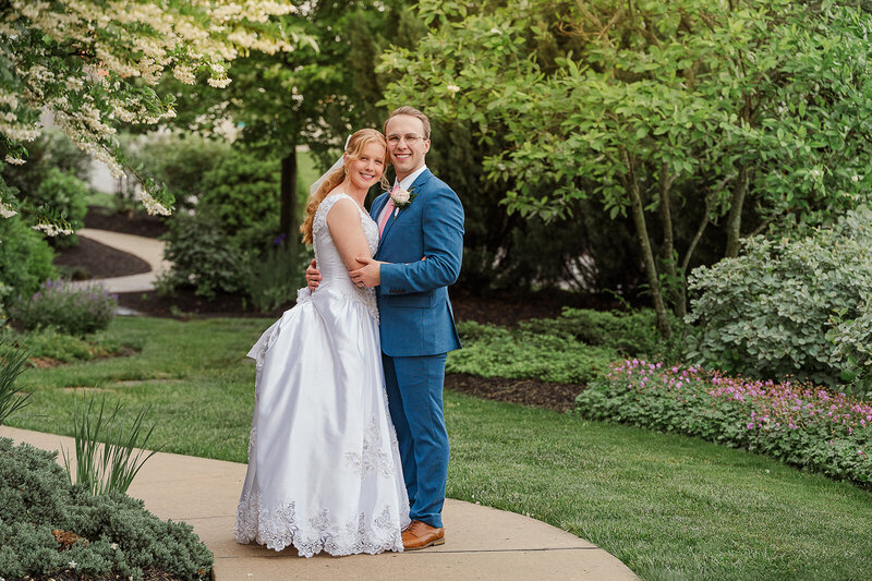 married couple at wyndridge farms on their wedding day by york and lancaster photographer