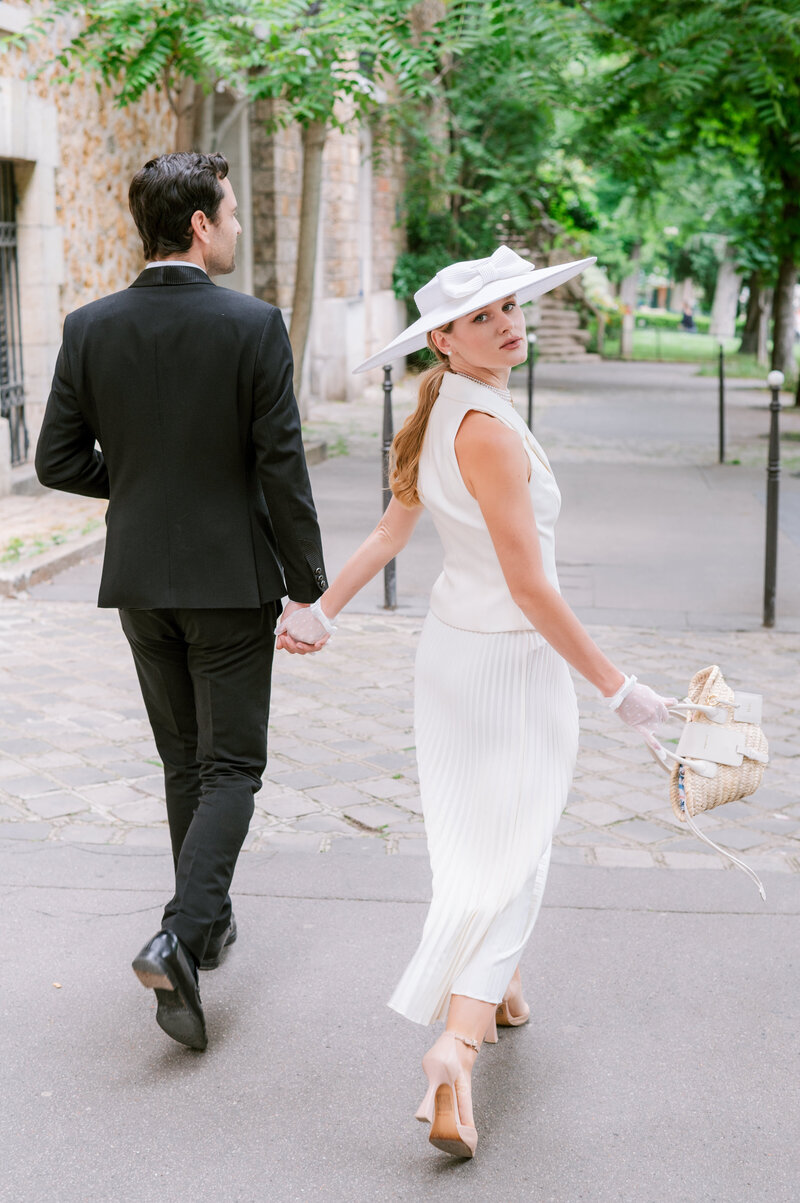 Bride and groom walk up memorial steps at their DC wedding