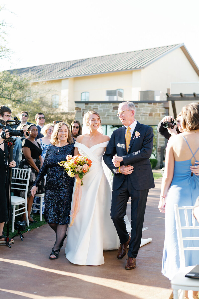 Outdoor ceremony at Canyonwood Ridge with panoramic Texas Hill Country views