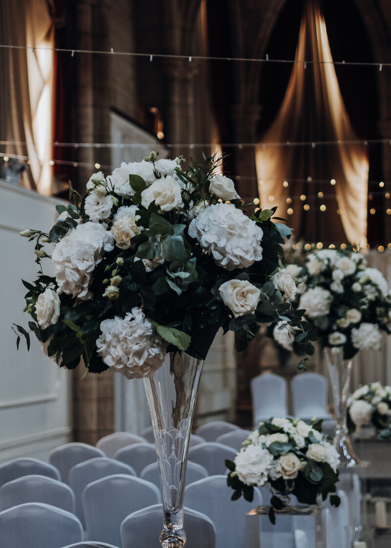 Large glass vase of flowers for Alverton hotel wedding