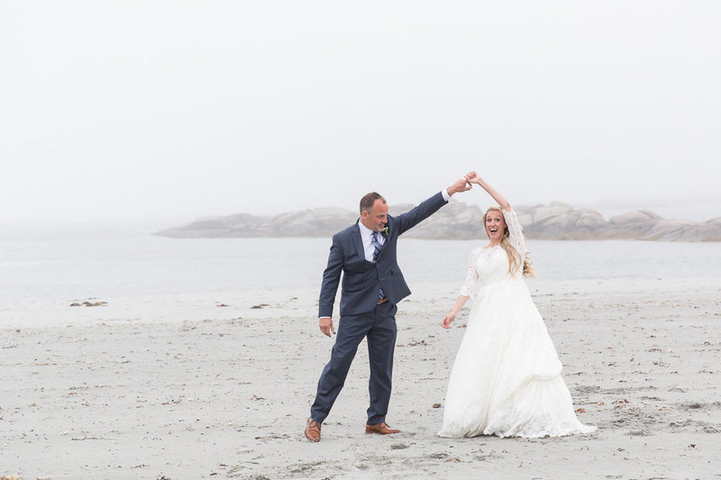 Bride & Groom dance at Gooseberry Beach during their portrait session