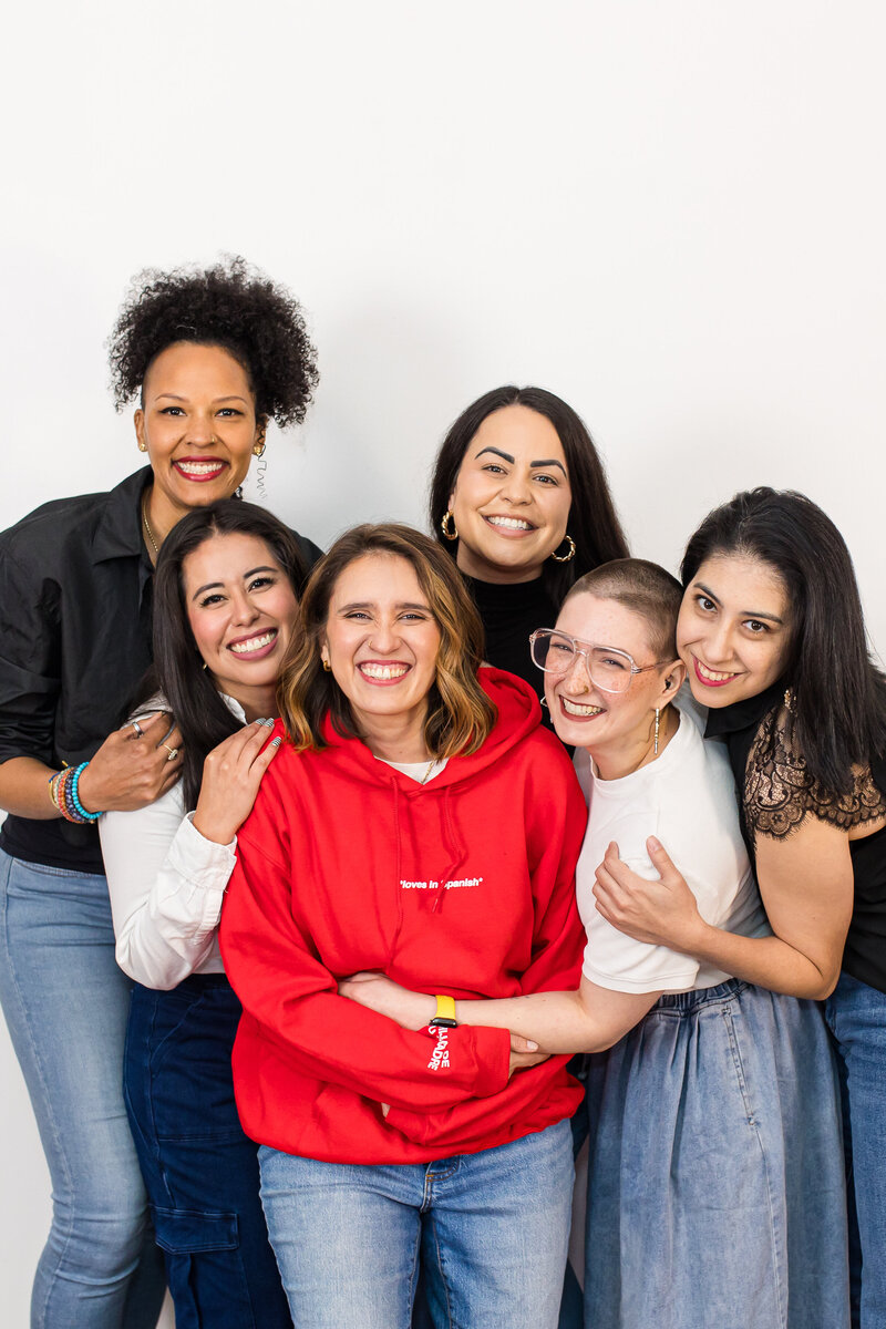 Custom small business website design expert from Hola Luz Creative Studio with powerful Latina women celebrating culture and confidence