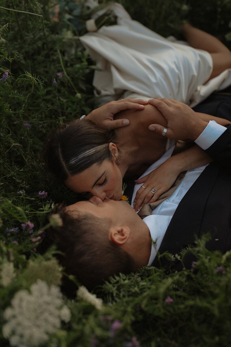 bride and groom share a kiss on wedding day in pei