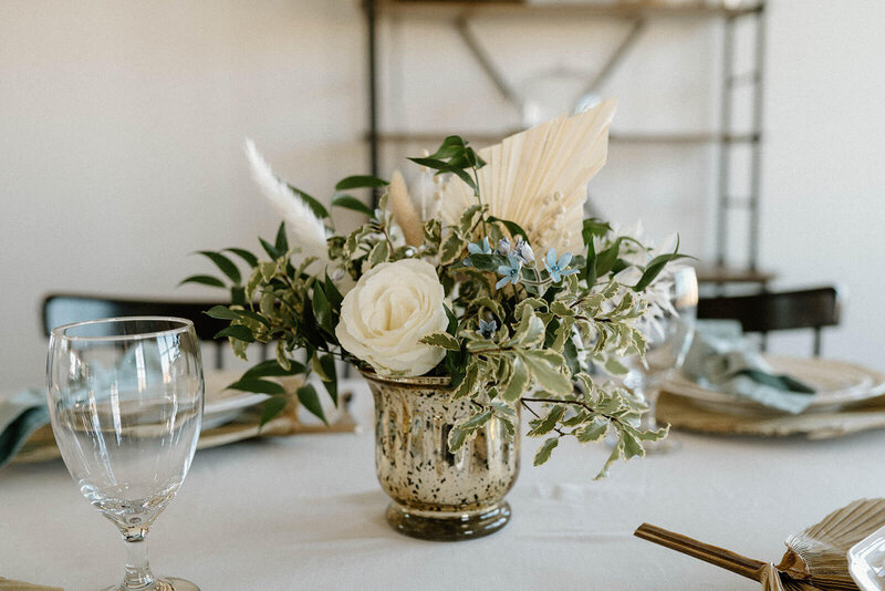 small centerpiece with white flowers