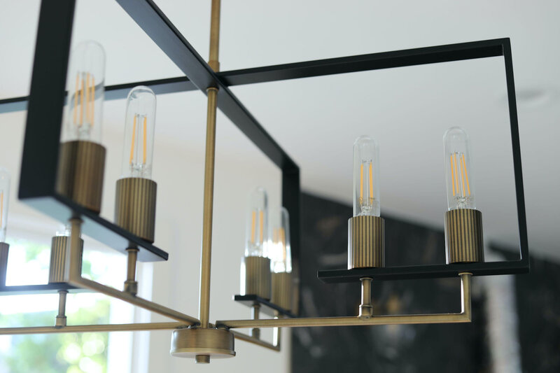 home office design with black and gold pendant light