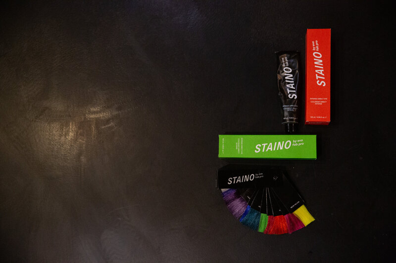 Personal trainer tying shoe