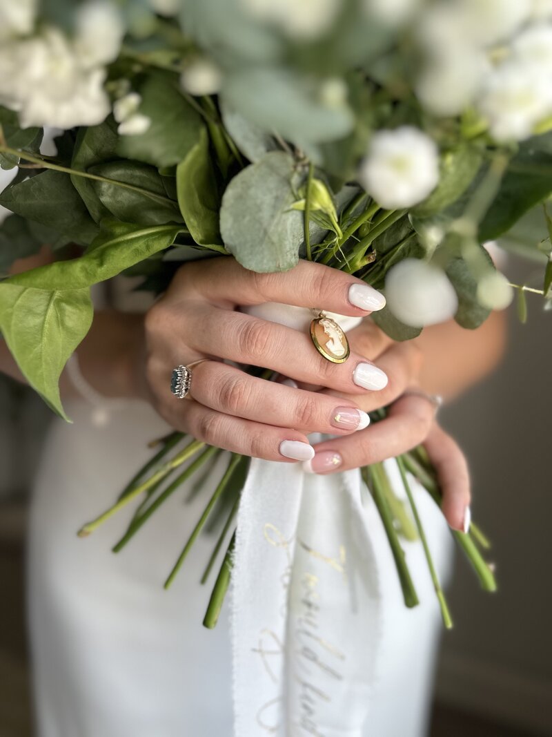 Bride holding her bouquet before getting married
