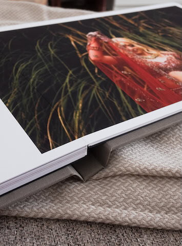 wedding album with pages open showing layflat pages